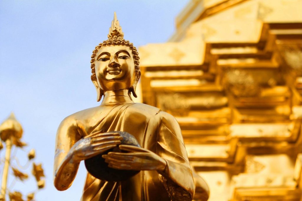 Golden Buddha Statue with Golden Temple