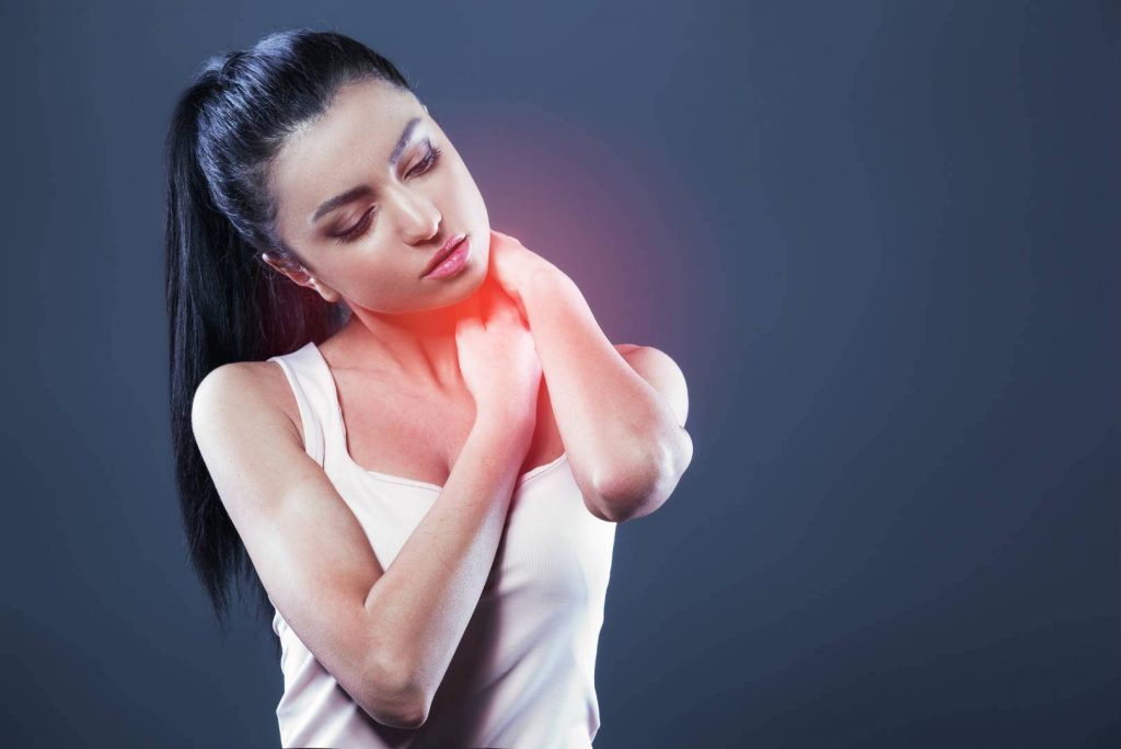 Woman Holding Her Neck Due to Pain and Aching