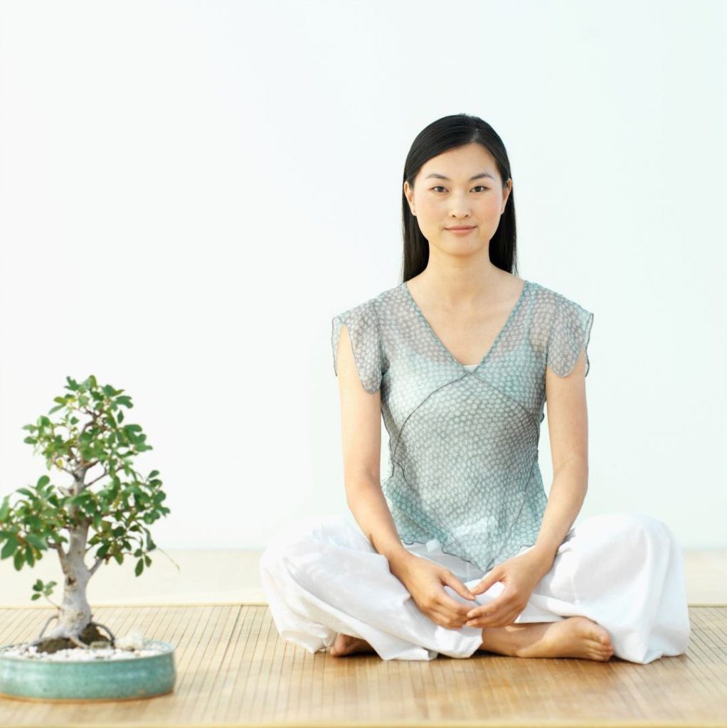 Woman Meditating with Eyes Open