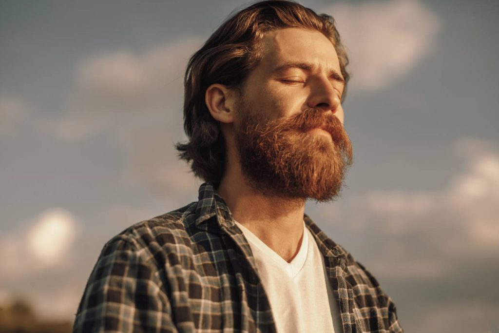 Calm Man Meditating Relaxed and Content