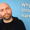 Thoughtful man with hand on head next to text ‘Why is this so hard?